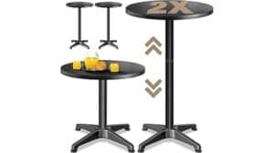 Zwei höhenverstellbare, schwarze, runde Casaria 2-in-1-Bartische mit kreuzförmigen Sockeln werden in unterschiedlichen Höhen gezeigt, wobei Saft und Gläser auf dem unteren Tisch platziert werden – ein großartiges Beispiel für vielseitige Casaria-Möbel.